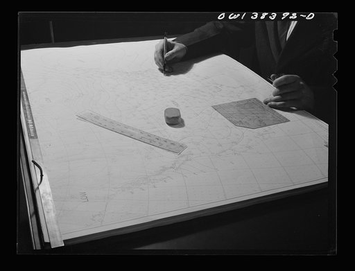 Washington, D.C. The U.S. Weather Bureau station at the National Airport. Weather observations being analyzed by a district forecaster preparatory to issuing a weather forecast