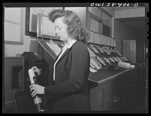 Washington, D.C. The U.S. Weather Bureau station at the National Airport. Receiving weather observations from all parts of the country by pneumatic tube from the nearby communications stations