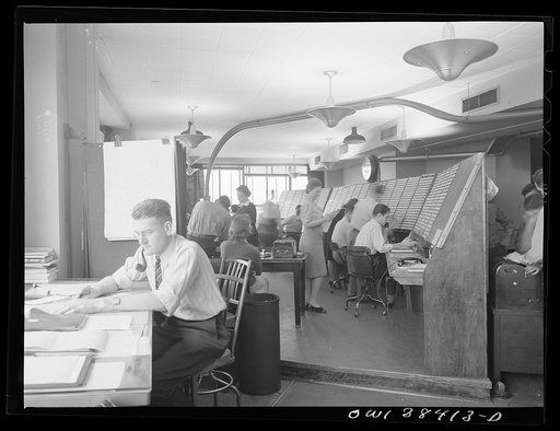 Washington, D.C. The U.S. Weather Bureau station at the National Airport. Flight advisory weather service. Here pilots in flight are warned of adverse weather conditions that might affect the safe operation of the aircraft