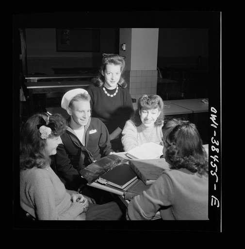 Untitled photo, possibly related to: Washington, D.C. Graduate from Woodrow Wilson High School in June, this sailor is surrounded by girls when he returns from a visit