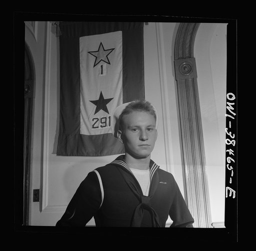 Untitled photo, possibly related to: Washington, D.C. A sailor who graduated in June, home on his first leave, visiting at Woodrow Wilson High School