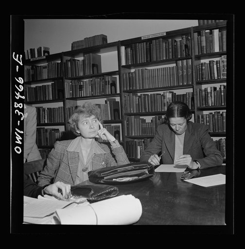 Washington, D.C. A member of the faculty listening to instructions for the distribution of ration books. Woodrow Wilson High School