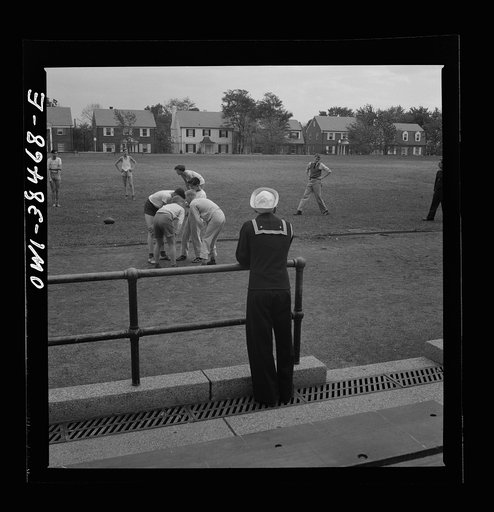 Untitled photo, possibly related to: Washington, D.C. A sailor who graduated in June, home on his first leave, visiting at Woodrow Wilson High School