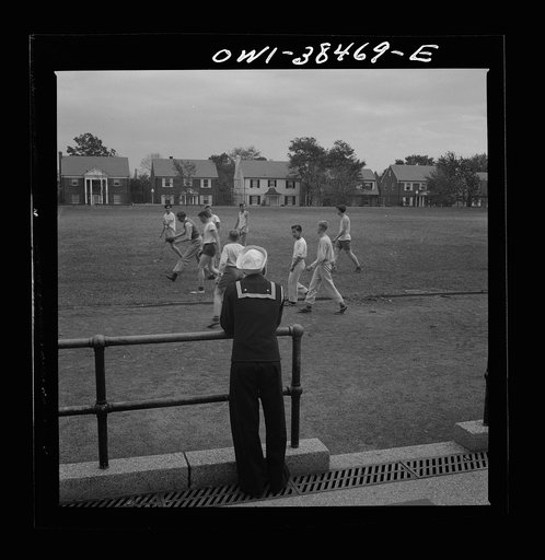 Untitled photo, possibly related to: Washington, D.C. A sailor who graduated in June, home on his first leave, visiting at Woodrow Wilson High School