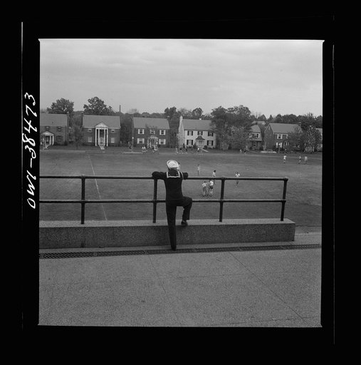 Washington, D.C. A sailor who graduated in June, home on his leave, visiting at Woodrow Wilson High School