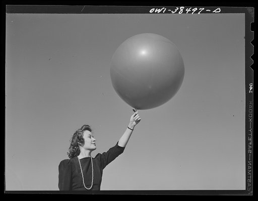 Washington, D.C. The U.S. Weather Bureau station at the National Airport. Pilot balloon being released to determine wind direction and velocity aloft
