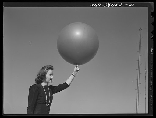 Washington, D.C. The U.S. Weather Bureau station at the National Airport. Pilot balloon being released to determine wind direction and velocity aloft