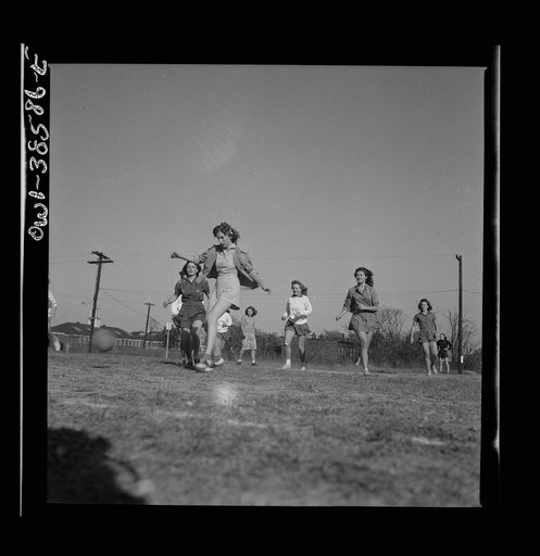 Untitled photo, possibly related to: Washington, D.C. Playing soccer in a physical education class at Woodrow Wilson High School