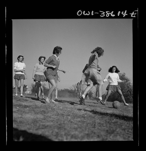 Washington, D.C. Playing soccer in a physical education class at Woodrow Wilson High School