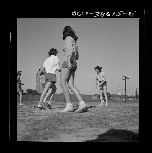 Washington, D.C. Playing soccer in a physical education class at Woodrow Wilson High School