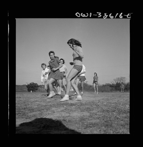 Washington, D.C. Playing soccer in a physical education class at Woodrow Wilson High School