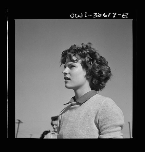 Washington, D.C. Listening to the teacher's instructions in a physical education class at Woodrow Wilson High School