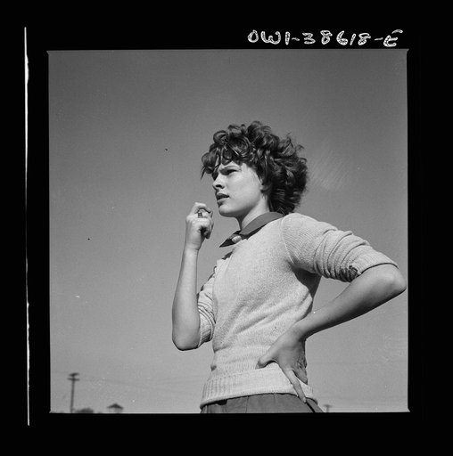 Washington, D.C. Listening to the teacher's instructions in a physical education class at Woodrow Wilson High School