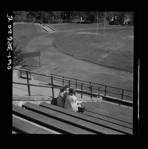 Washington, D.C. Girls sitting in front of the Woodrow Wilson High School during their lunch hour