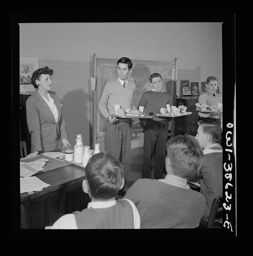 Washington, D.C. Mrs. Mary Spangler teaching a boys' class in nutrition at Woodrow Wilson High School