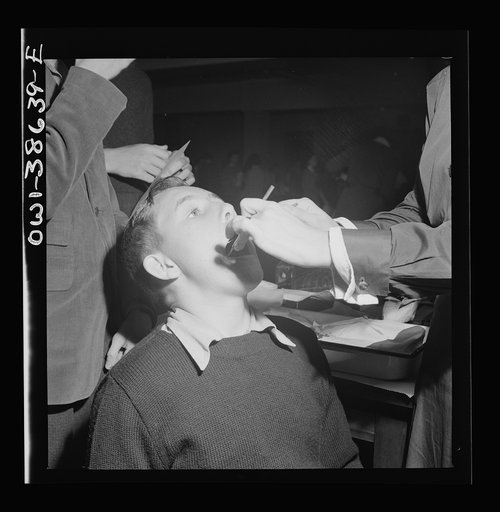 Washington, D.C. Student having his teeth examined an annual procedure at Wilson High School