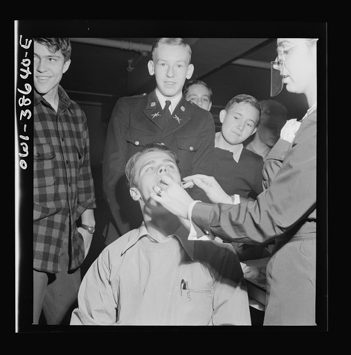 Washington, D.C. Student having his teeth examined an annual procedure at Wilson High School