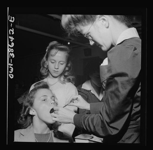 Washington, D.C. Student having her teeth examined, an annual procedure at Wilson High School