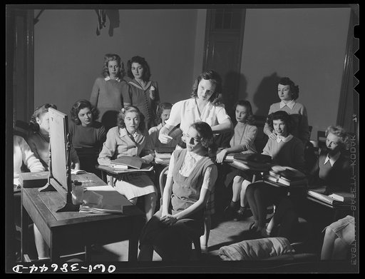 Untitled photo, possibly related to: Washington, D.C. Mrs. Mary Spangler watching students of her home management class at Woodrow Wilson High School demonstrate how to apply street makeup