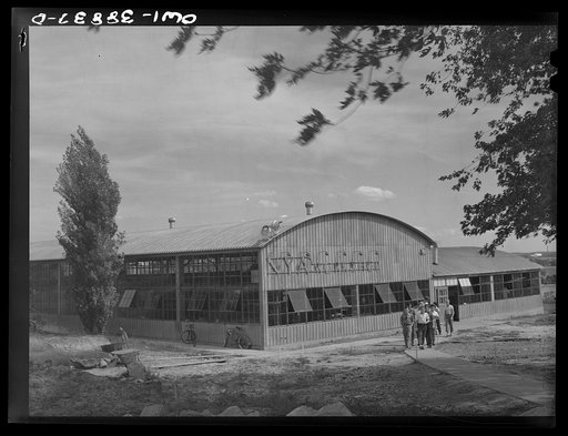 Miscellaneous lot of photographs by Barbara Wright. National Youth Administration (NYA), Works Progress Administration (WPA) and Civilian Conservation Corps (CCC). Saint Louis, Missouri. Standard construction of a NYA machine shop. Hundreds of this type of shops were set up for defense training at t