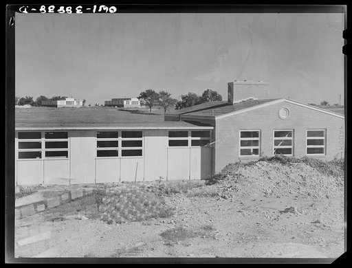 Miscellaneous lot of photographs by Barbara Wright. National Youth Administration (NYA), Works Progress Administration (WPA) and Civilian Conservation Corps (CCC). Saint Louis, Missouri. Final phase construction, NYA war training center