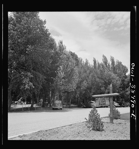 Miscellaneous lot of photographs by Barbara Wright. National Youth Administration (NYA), Works Progress Administration (WPA) and Civilian Conservation Corps (CCC). Sign and picnic tables. NYA park near Cheyenne, Wyoming