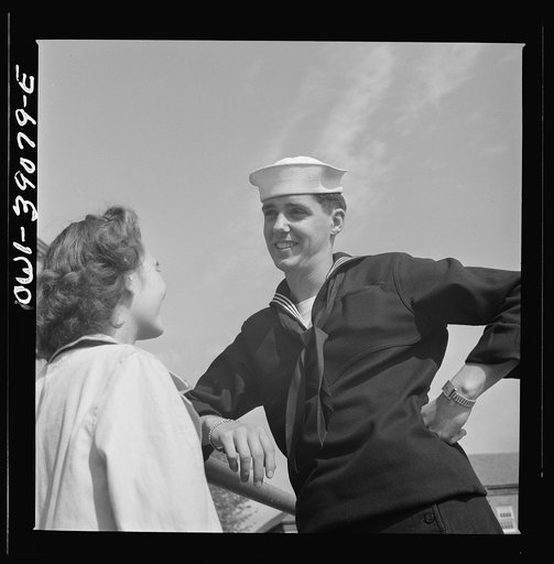 Washington, D.C. A Woodrow Wilson High School student, now in the U.S. Navy, talking to a girl