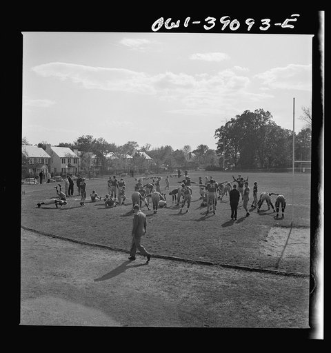 Washington, D.C. Woodrow Wilson High School football team limbering up before a game