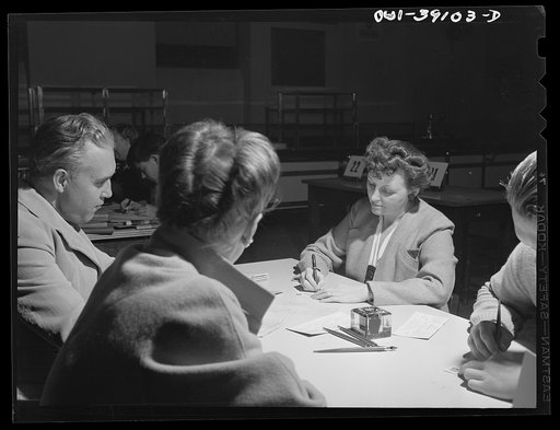 Washington, D.C. Mrs. Mary Spangler, Woodrow Wilson High School teacher, issuing ration books