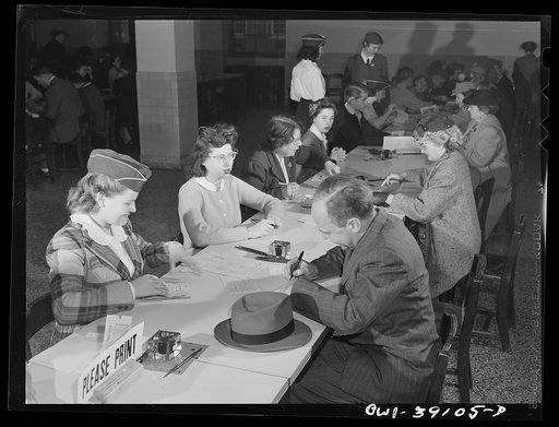 Washington, D.C. High school students helping to issue number four ration books at Woodrow Wilson High School