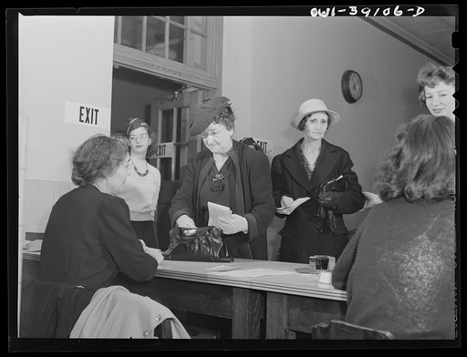 Washington, D.C. Ration book applicants checking out at Woodrow Wilson High School