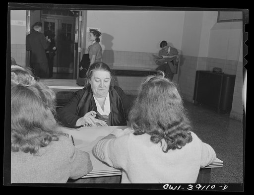 Washington, D.C. An applicant for a number four ration book at Woodrow Wilson High School