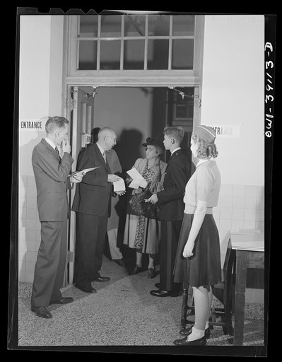 Washington, D.C. Faculty member and students assisting ration book applicants at Woodrow Wilson High School