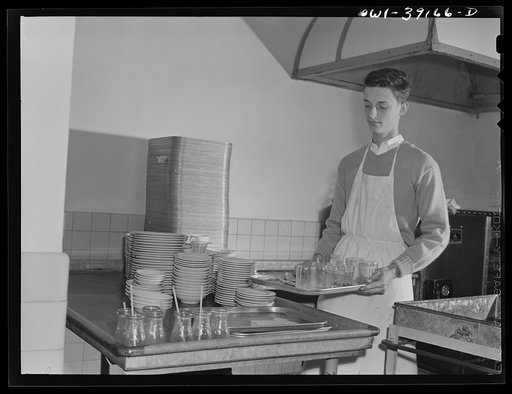 Washington, D.C. Student busboy working in the kitchen of the cafeteria at Woodrow Wilson High School