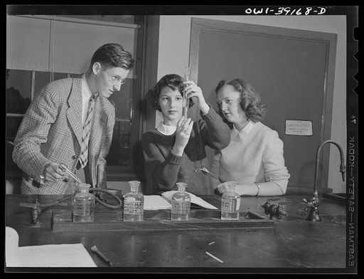 Washington, D.C. Members of a chemistry class at work in the laboratory at Woodrow Wilson High School