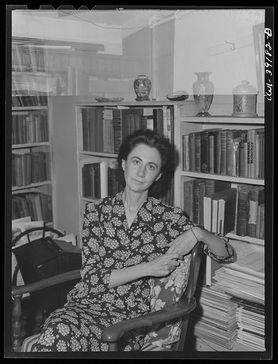 Untitled photo, possibly related to: Washington, D.C. Miss Norma Kale, Woodrow Wilson High School English instructor, correcting papers at her home in the evening