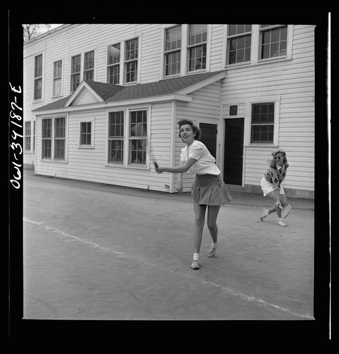 Washington, D.C. Sally Dessez, a student at Woodrow Wilson High School, playing a tennis match