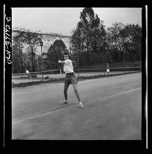 Washington, D.C. Sally Dessez, a student at Woodrow Wilson High School, playing a tennis match