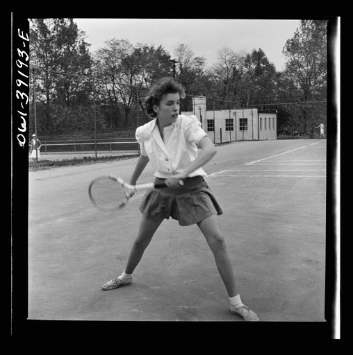 Washington, D.C. Sally Dessez, a student at Woodrow Wilson High School, playing a tennis match