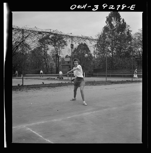 Washington, D.C. Sally Dessez, a student at Woodrow Wilson High School, playing a tennis match