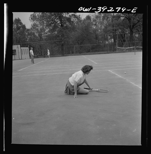 Washington, D.C. Sally Dessez, a student at Woodrow Wilson High School, playing a tennis match