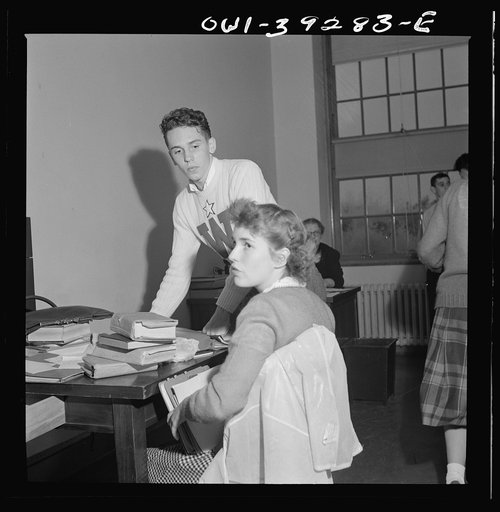 Washington, D.C. Sally Dessez, editor of the Woodrow Wilson High School yearbook, talking with Walter Spangenberg in the publications office