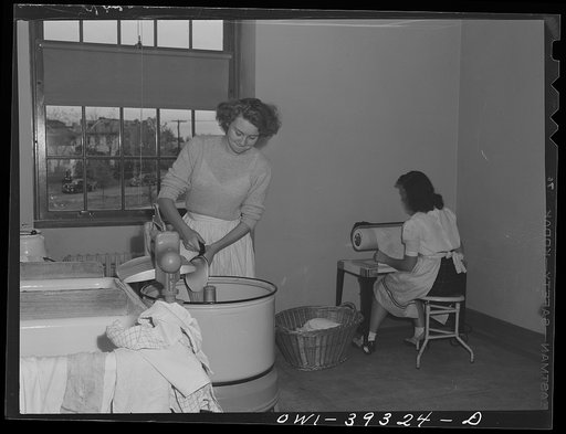 Untitled photo, possibly related to: Washington, D.C. Home economics students working in the model laundry at the Woodrow Wilson High School