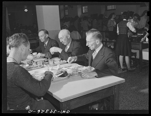 Washington, D.C. Male faculty members in the cafeteria at Woodrow Wilson High School