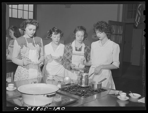 Washington, D.C. Members of a cooking class sampling each other's work at the Woodrow Wilson High School