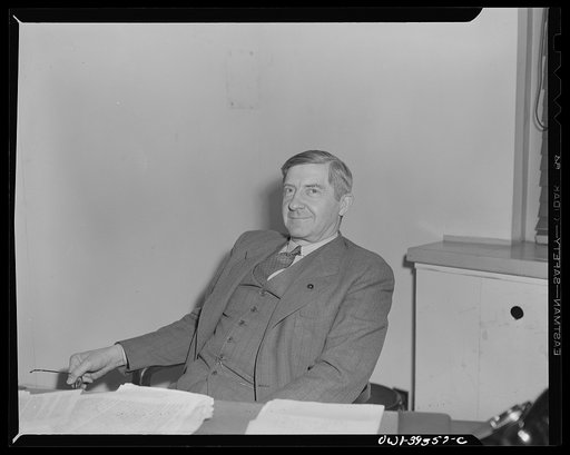 Washington, D.C. Reuben H. Markham, director of region V, Overseas Branch of the Office of War Information