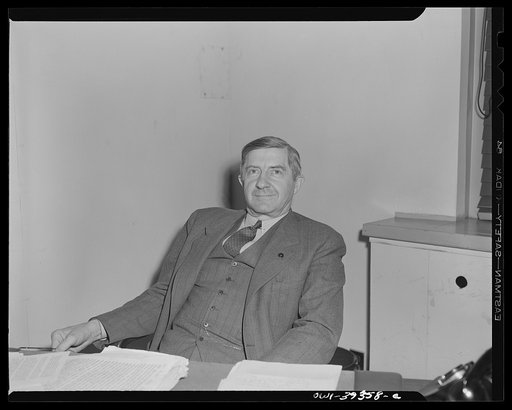 Washington, D.C. Reuben H. Markham, director of region V, Overseas Branch of the Office of War Information