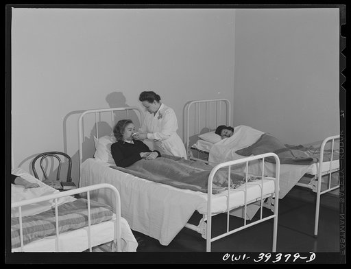 Washington, D.C. Students in the Woodrow Wilson High School infirmary are attended by the school nurse. Those who are not able to take strenuous exercise may rest here during their gymnasium periods