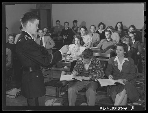 Washington, D.C. Chemistry student at Woodrow Wilson High School showing the results of his experiment to the class