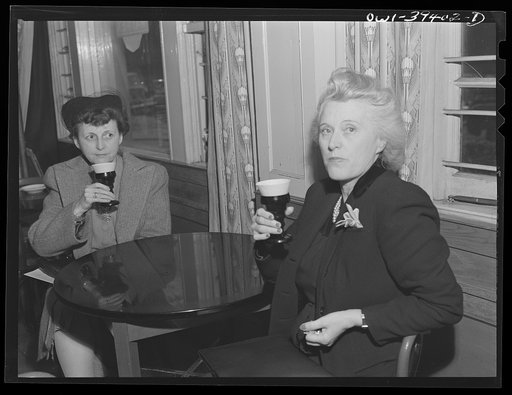 Untitled photo, possibly related to: Washington, D.C. Mrs. Mary Spangler, a Woodrow Wilson High School teacher stopping at a drugstore for a Coca-Cola before going to a meeting with a school supervisor